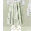 Conjunto Estilo Academia 2026 para Niñas Moda Camisa de Muñeca con Solapa Falda de Dibujos Animados con Lazo Conjunto de Dos Piezas Primavera y Otoño