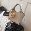 Bolso de Mano Texturizado de Moda Transfronterizo Tipo Cubo para Mujer 2026 Nueva Moda Primavera/Verano Versátil para Viaje Cruzado Pequeño