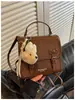 Mochila casual trendy estilo universitario 2026 versión coreana para mujer, moderna y elegante para ir al trabajo y viajar, mochila pequeña y bolso de mano para mujer