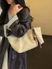 Bolso de mano exquisito de nicho estilo coreano, bolso de hombro, bolso para el antebrazo de uso diario, bolso de mujer, bolso tote de lunares, nuevo modelo para mujer