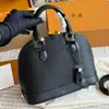 2026 Nueva Bolsa de Concha de Onda de Agua Bolso de Mano de Charol Negro Bolso Cruzado de Hombro Único para Mujer en Color Rojo Vino Versátil y de Moda