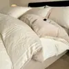 Ropa de cama retro estilo francés de cuatro piezas de terciopelo de leche engrosado para otoño e invierno, con patrones tallados tridimensionales y forro de felpa de doble cara