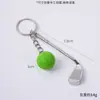 Venda quente transfronteiriça mini raquete de golfe de metal e pingente de bola chaveiro de bolsa pingente pequena bola de golfe