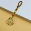 Pingente Chaveiro de Carro Bússola Oito Tesouros Auspiciosos Banhado a Ouro com Fivela de Segurança cravejada de Diamantes, Rotativo, para Amigas