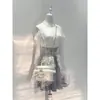 En stock: el Comienzo de la Historia - Conjunto de Dos Piezas Pequeño Transparente Estilo Japonés: Top Blanco Asimétrico + Falda Corta de Retazos