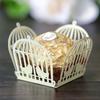 Caja de decoración de boda de estilo europeo, jaula hueca con láser para pájaros del amor, papel de chocolate con encaje, fábrica en stock, venta directa