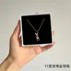 [56] logotipo de comercio exterior sin marca acero de titanio joyería Europa y Estados Unidos variedad de hip-hop apilado collar de clavícula de acero de titanio