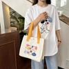 Bolso de lona portátil coreano, bolso de momia, bolso de hombro literario, pequeño bolso cuadrado, bolso de almuerzo, venta al por mayor, novedad de 2024