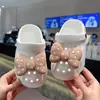Zapatillas infantiles de dibujos animados lindas para Amazon transfronterizas zapatos con agujeros de EVA verano para casa antideslizantes desodorantes zapatos con agujeros para niños