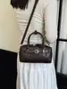 Bolso tipo almohada versátil y elegante transfronterizo para mujer, con un diseño de inspiración coreana, perfecto para el uso diario, ir al trabajo y como un simple bolso cruzado.