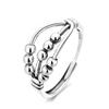 Anillo cruzado retro envejecido de tres capas para mujer, cuentas redondas giratorias, nicho, alta gama, anillo para el dedo índice, apertura ajustable, producto nuevo