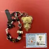 Llavero de mercancía del anime Honor of Kings, colgante de bolsa dorado de Xiaoqiao, decoración de oro puro 999, venta al por mayor para transmisión en vivo