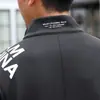 Novo Traje de Grupo para Jogos Esportivos de Primavera Traje Esportivo Masculino e Feminino Casaco de Treinador de Wushu Uniforme Escolar Personalizado Atacado