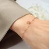 Pulsera redonda exquisita europea y americana de acero de titanio chapado en oro de 18 quilates E135