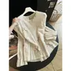 Camisa de ramio bordada para mujer, hermosa para vacaciones, corte holgado, adelgazante, ligera, top protector solar, color albaricoque con estampado floral, directo de fábrica