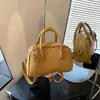 Bolsa cuadrada pequeña textura femenina sentido diagonal 2026 nuevo estilo verano atmosférica moderna simple un solo hombro cruzada tejida japonesa coreana