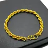 Joias de Ouro Imitação 18K Pulseira Banhada a Ouro para Homens e Mulheres, Elegante e Versátil 12mm Fivela Dupla Pulseira Nk Fornecedor de Fabricante de Barraca de Rua