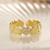 Anillo Abierto Geométrico de Corazón Chapado en Cobre Dorado de 18K con Circonita Aogu Simple y Personalizado Anillo Versátil de Lujo Accesible de Nicho para Mujer
