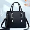 Bolsa de mãe de meia-idade, tudo combinando, verão 2024, nova moda, bolsa popular, bolsa mensageiro de ombro único, bolsa feminina atmosférica
