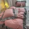 Coração de menina rosa puro algodão lavado conjunto de quatro peças estilo princesa renda folha de lótus capa de edredom lençol saia de cama conjunto de três peças para dormitório