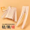 Ropa interior térmica de lyocell para otoño e invierno, capa base fina, camiseta de capa base, suave, amigable con la piel, sin costuras, cuello redondo, conjunto cálido para mujer