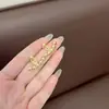 Pendientes de Perlas de Estilo Popular Transfronterizo Europeo y Americano de Dos Formas con Diseño de Moda, Joyería para Orejas de Lujo Ligero de Moda y Personalizada