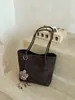 Bolsa casual estilosa de grande capacidade 2026 novo modelo bolsa de ombro casual bolsa de axila padrão trançado bolsa sacola para o dia a dia