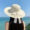 Sombrero de paja de ala ancha de verano para mujer, protección solar de moda para salidas y vacaciones en la playa, sombrero de sol de playa con lazo de encaje