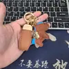 Agora mesmo chaveiro rico acessórios criativo couro de cordeiro personalidade fofo desenho animado zodíaco bolsa chaveiro de carro pingente