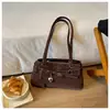 Bolso de axila de alta gama, de nicho, para mujer, nueva colección otoño/invierno 2026, gran capacidad, versátil, adecuado para ir al trabajo, bolso de hombro, bolso tote, bolso baguette