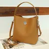 Exclusivo Transfronteiriço Mais Vendido Bolsa Feminina Bolsa Saco Bolsa de Mão Feminina em Couro Genuíno High-End de Nicho Fábrica Fonte Atacado