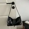 Bolso de axila elegante, moderno y versátil para mujer, nuevo bolso de mano casual simple, bolso de hombro retro de nicho