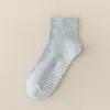 Meias infantis meninas Zhuji meias esportivas brancas atacado meias cano alto absorventes de suor meninos e estudantes meias brancas