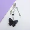 Corrente de Celular Borboleta Cruzada para Menina Doce e Descolada Design de Nicho Estilo Japonês Retro Pingente Guben Chaveiro