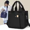 Bolsa Tote Estilo Japonês Transfronteiriça 2023 Nova Bolsa de Lona Feminina Bolsa de Almoço Casual Mais Fácil de Combinar Bolsa de Mão Bolsa Transversal para o Trabalho