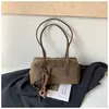 Bolso tipo baguette liso, minimalista y texturizado para mujer, nueva colección otoño 2026, bolso de mano estilo coreano, diseño único, bolso de hombro, moderno