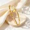 Nuevo brazalete abierto tipo nudo de bambú estilo chino, pulsera de acero de titanio de lujo ligero, accesorio versátil y simple con un toque de alta gama