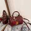 Bolso Retro de Nicho para Mujer Otoño 2025 Nuevo Bolso Almohada Textura Bolso de Mano Trendy Casual Bolso de Hombro Cruzado
