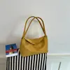 Bolso de axila texturizado de nicho para otoño e invierno para mujer, nuevo bolso cubo de gamuza 2026, bolso de hombro simple