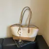 Bolso de axila de alta gama para mujer transfronterizo, nueva moda otoño 2026, bolso popular para la oficina y el trabajo, bolso tote versátil