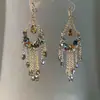 Pendientes de gota con incrustaciones de diamantes transfronterizos europeos y americanos, pendientes de lujo de alta gama, accesorios para orejas de moda de nicho, venta al por mayor desde fabricante de Yiwu