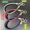 Nova pulseira de couro triangular com fivela dupla para celular, acessório universal, pulseira simples com fivela dupla, corrente de suspensão anti-queda
