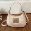 Bolso de cuadros de nicho exquisito y moderno para mujer, nuevo modelo 2026, minibolso cruzado versátil, bolso tipo dumpling, bolso de mano pequeño para salir