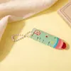 Regla de Palma de Lápiz Creativa Caricatura Mini Regla Portátil Colgante de Mochila Regla de Medición Papelería para Estudiantes Pequeño Regalo