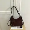 Mochila de Felpa de Gamuza Súper Caliente para Mujer 2026 Nueva de Gran Capacidad Bolso de Hombro Retro Mate Versátil para Viajar Bolso Cruzado