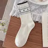 Nueva colección de principios de otoño: calcetines versátiles de color gris con estampado de corazones en forma de diamante hasta la mitad de la pantorrilla para mujer. Calcetines de mujer a juego estilo coreano, hechos de algodón