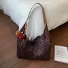 Bolsa de Axila Retrô Fashionável de Outono para Mulheres 2025 Nova de Grande Capacidade Fosca de Alto Padrão de Ombro Único Transversal