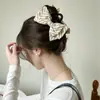 Clip para el pelo con lazo a rayas estilo fresco de primavera 2026 para la parte trasera de la cabeza Pasador Accesorio para el pelo
