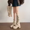 Botas de caballero retro atmosféricas 2026 hebilla de barril apilada tacón grueso suela gruesa estilo versátil aptas para múltiples atuendos