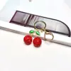 Llavero Colgante Popular Creativo Transfronterizo con Pedrería Cereza Llavero de Coche Adorno de Arcilla Pedrería Accesorio para Bolsa